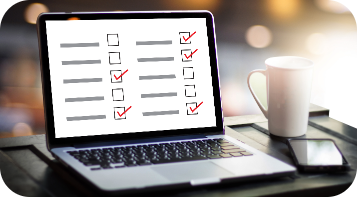 Laptop showcasing the checklist refers to assesment process